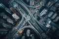 Aerial View of Busy City Intersection With Vehicles and Pedestrians, A city labyrinthine network of roads from an aerial